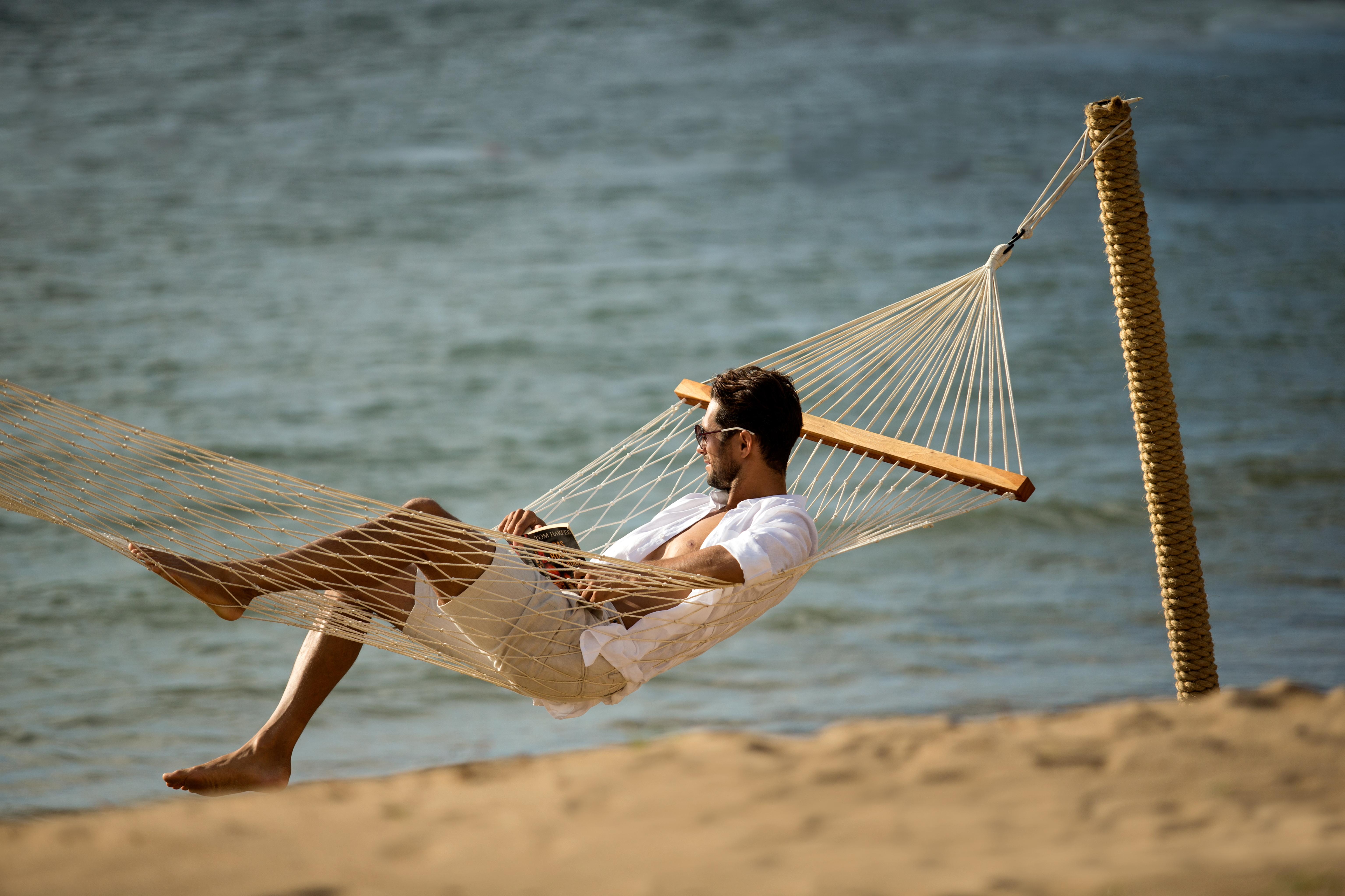 Sadara Resort Nusa Dua  Ngoại thất bức ảnh A man relaxing in a hammock